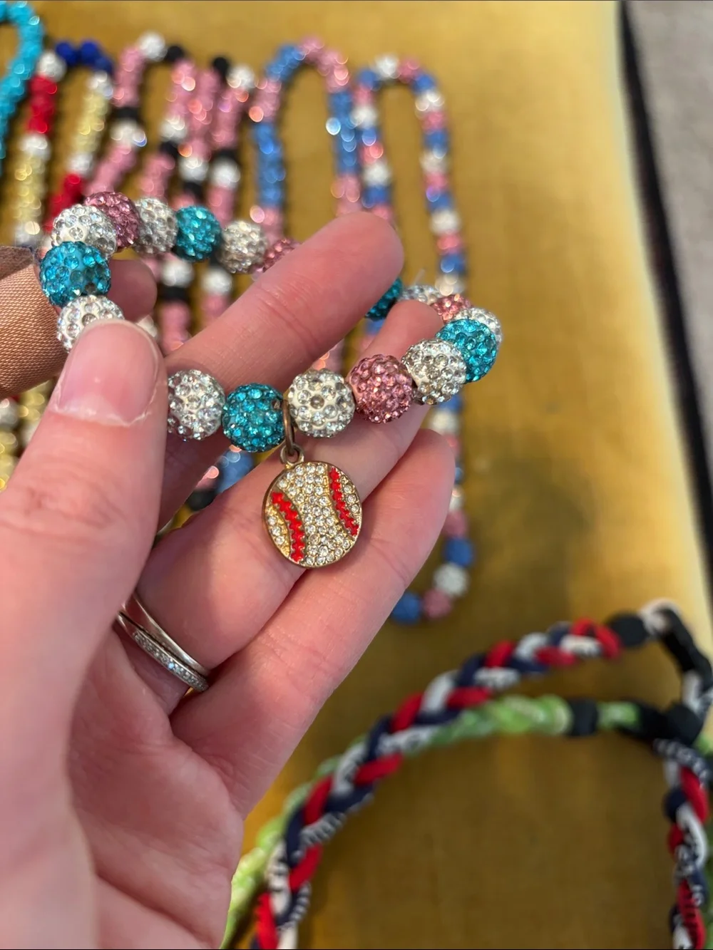 Bundle of baseball necklaces and bracelet